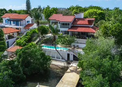 an aerial view of a resort with a swimming pool at La casa del lago in Cumayasa
