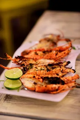 three pieces of food on a plate on a table at Batey Hotel Boutique in Boca Chica