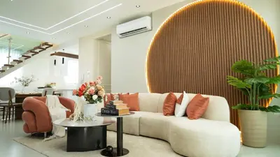 a living room with a couch and a table at Luxurious 3-Bedroom Retreat in Santiago de los Caballeros in Santiago de los Caballeros