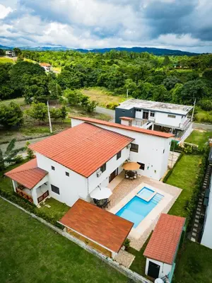 an aerial view of a house with a swimming pool at Our dreams house in Jarabacoa