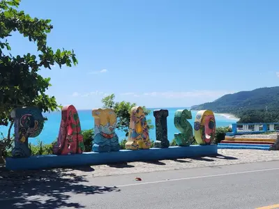 a sign that says love on the side of a road at 2 Bdrm, 1 Bath, Wifi, Near River and Beach, 3R, Paraiso, Barahona in Paraíso