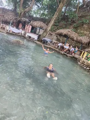 a woman swimming in a pool in the water at 2 Bdrm, 1 Bath, Wifi, Near River and Beach, 3R, Paraiso, Barahona in Paraíso