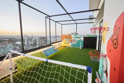 a indoor basketball court on the balcony of a building at Your space luxury in naco in Colorado