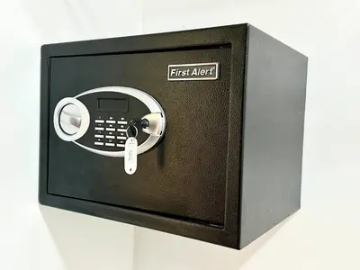 a black first alert phone with a telephone at Soha Suites II Deluxe in Colorado