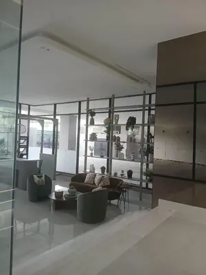 a living room with a couch and a table at Downtown, Cozy and Modern! in Santo Domingo