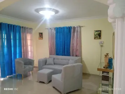 a living room with a couch and a chair at Casa vacanza, Mendosa in Bayaguana
