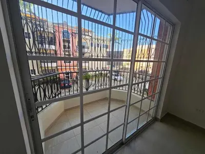 a large window with a view of a city at apartamiento reyes in Pantoja