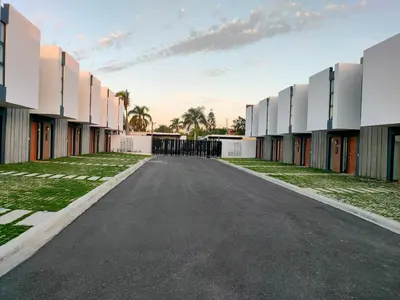 an empty street in front of a building at Pure relax in Bavaro La Casita de Giò in Punta Cana