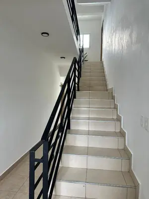 a staircase in a building with a stair railing at Luz y paz