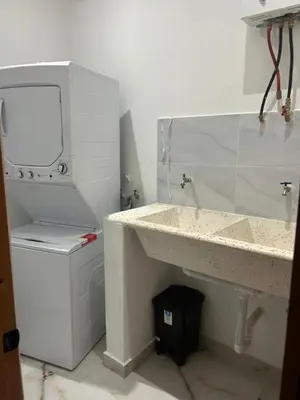 a bathroom with a sink and a mirror at Tropical oasis rentas in Las Terrenas