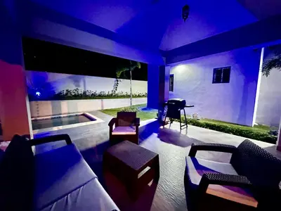a living room with a couch and a piano at Azotea Quinta Galarza