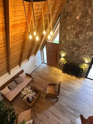 an overhead view of a living room with wooden floors at La gloria