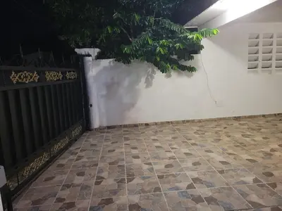 a room with a white wall and a tile floor at Hacienda Francisco in Concepción de La Vega