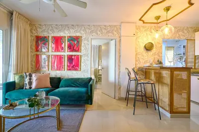a living room with a couch and a table at ®{The-Comfty-Spot} Experience @SD WiFi in Santo Domingo