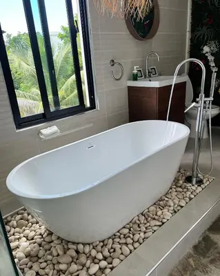 a white bath tub in a bathroom with a sink at Monte y Cielo 1 apartment in Las Galeras