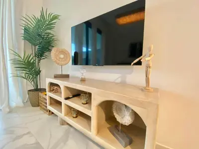 a wooden table with a mirror on top of it at 1B Fantasy Lodge @t Canabay Private Pool and beach in Punta Cana