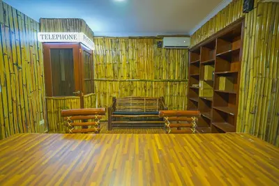 a conference room with a large wooden table and chairs at Luxury Caribbean penthouse in Santo Domingo