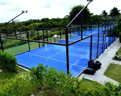 an overhead view of a tennis court at Peaceful 2BR Retreat with Pool, Paddle Court & Private Beach Access in Punta Cana
