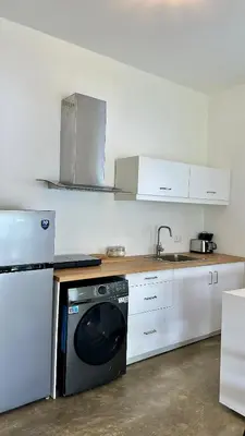 a kitchen with a dishwasher and a sink in it at Villa Turquesa En Dreams House - 5 pax, 2 min de la playa in Las Galeras