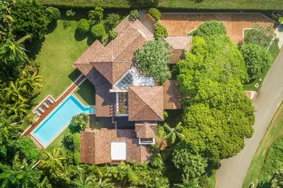 an aerial view of a house with a swimming pool and trees at Villa Maji Luxury Private Villa Steps from the Ocean Sea Horse Ranch Cabarete in Cabarete