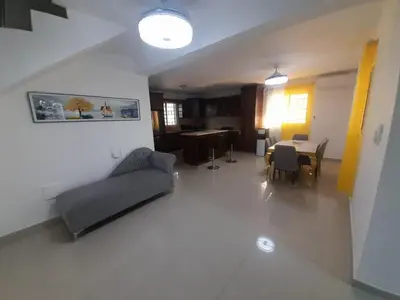 a living room with a couch and a table at Naime 3 Bristol villa in San Pedro de Macorís