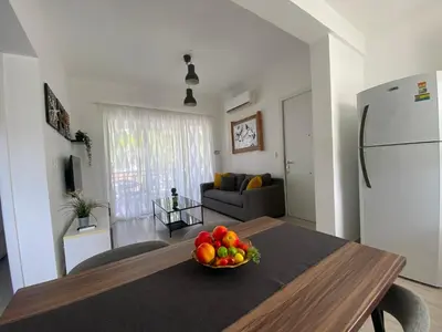 a bowl of fruit on a table in a living room at Your Beautiful Village Central 5 Min from the Beach in Punta Cana