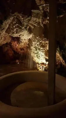 a bath tub in a cave with water in it at La Cueva Eco-Lodge in Las Galeras