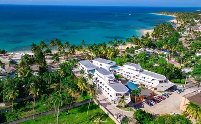 an aerial view of a resort next to the ocean at Puerto Plaza Las Terrenas in Las Terrenas