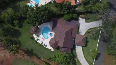 an overhead view of a house with a swimming pool at Villa Maud in La Romana