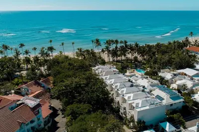 an aerial view of a resort and the ocean at Amazing Apartments, A-Juan Dolio, El Bonito II in Juan Dolio