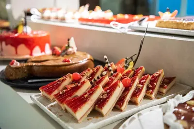 a bunch of food on a buffet table at Grand Sirenis Punta Cana Resort & Aquagames - All Inclusive in Punta Cana