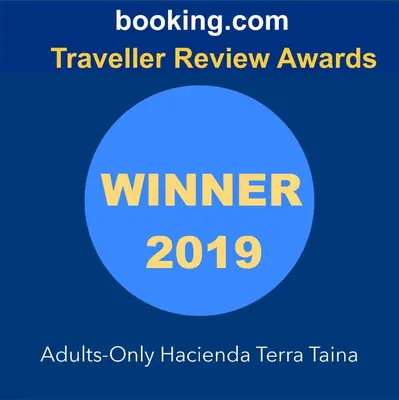 a sign that says winter with a blue circle at Adults-Only Hacienda Terra Taina in Las Terrenas