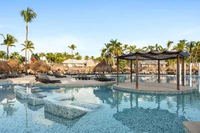 a pool at the excellence punta cana resort at Grand Palladium Punta Cana Resort & Spa - All Inclusive in Punta Cana