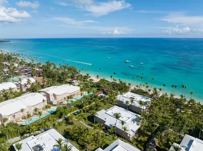 an aerial view of a resort and the ocean at Grand Palladium Palace Resort Spa & Casino - All Inclusive in Punta Cana