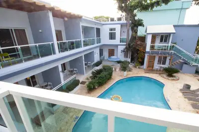 an aerial view of a building with a swimming pool at Casa Valeria Boutique Hotel in Sosúa