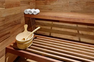 a wooden tub with a bucket and a wooden spoon at Holiday Inn Santo Domingo by IHG in Santo Domingo