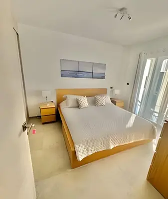 a bedroom with a bed and a window at Estrella Dominicus Advantage in Bayahibe