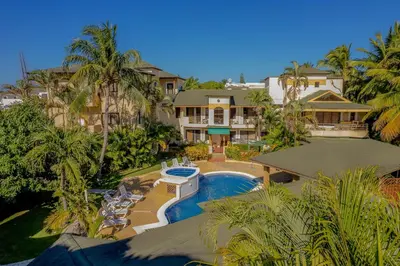 an aerial view of a resort with a swimming pool at D'Piero Hotel in Sosúa