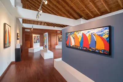 a museum with a large painting on the wall at Hotel Casa Hemingway in Juan Dolio