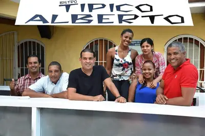 a group of people posing for a picture at Ocean Front Two Bedroom Penthouse in Sosúa