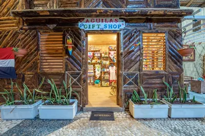 a store with plants in pots in front of a door at Glamping EcoLodge Cueva De Las Aguilas in Pedernales