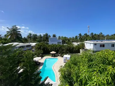 an aerial view of a resort with a swimming pool at Diamond Hotel Cabarete in Cabarete
