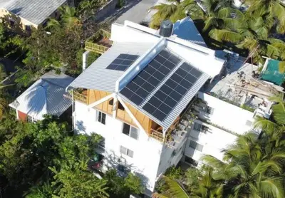 an overhead view of a house with solar panels on it at Villa Florencia Bavaro in Punta Cana