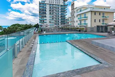 a swimming pool on the roof of a building at Crowne Plaza Santo Domingo by IHG in Santo Domingo