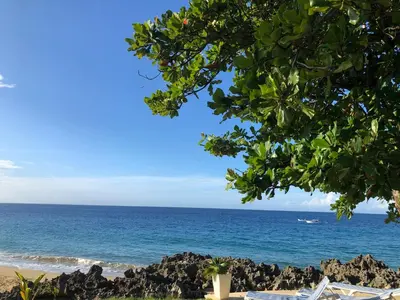 a view of the ocean from the beach at Vacations in the Caribbean Paradise in Sosúa