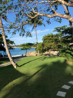 a golf course with a view of the ocean at Vacations in the Caribbean Paradise in Sosúa