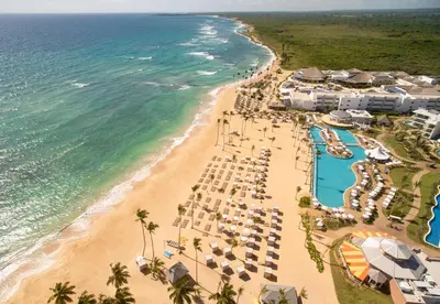 an aerial view of the beach at a resort at Nickelodeon Hotels & Resorts Punta Cana - Gourmet All Inclusive by Karisma in Punta Cana