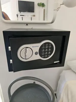 a tv with a remote control and a tvictericter at Apartamento Costa Azul en El Pueblito in San Felipe de Puerto Plata