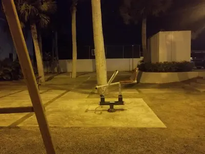 a small plane sitting on the ground at night at Oasis Palma Real santiago, Republica Dominicana in Santiago de los Caballeros