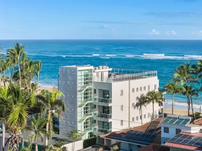 an aerial view of a building and the ocean at Watermark Luxury Oceanfront Residences in Cabarete